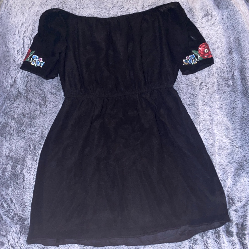 Black mini dress with floral stitching